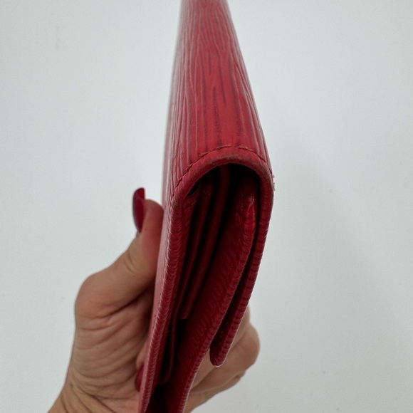Authentic Louis Vuitton Red Epi Leather Porte Tresor
International Wallet - Picture 9 of 17